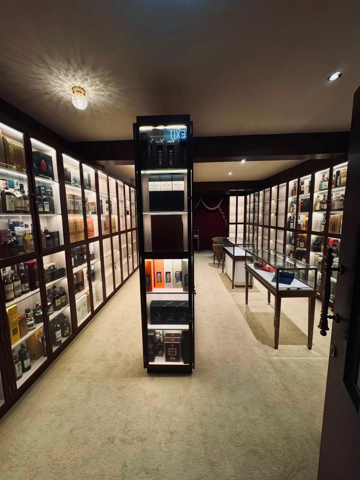 A boutique whiskey showroom with a chandelier, serving as storage and a place to sell my whisky